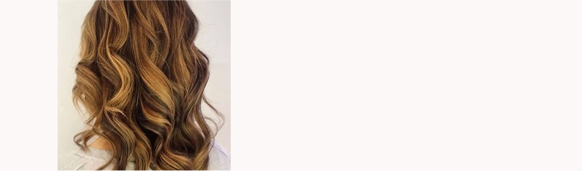 UGC image from Pinterest: warm light brunette highlights Aveda color by Aveda Artist Amie at Storm Hair Group in Canada.